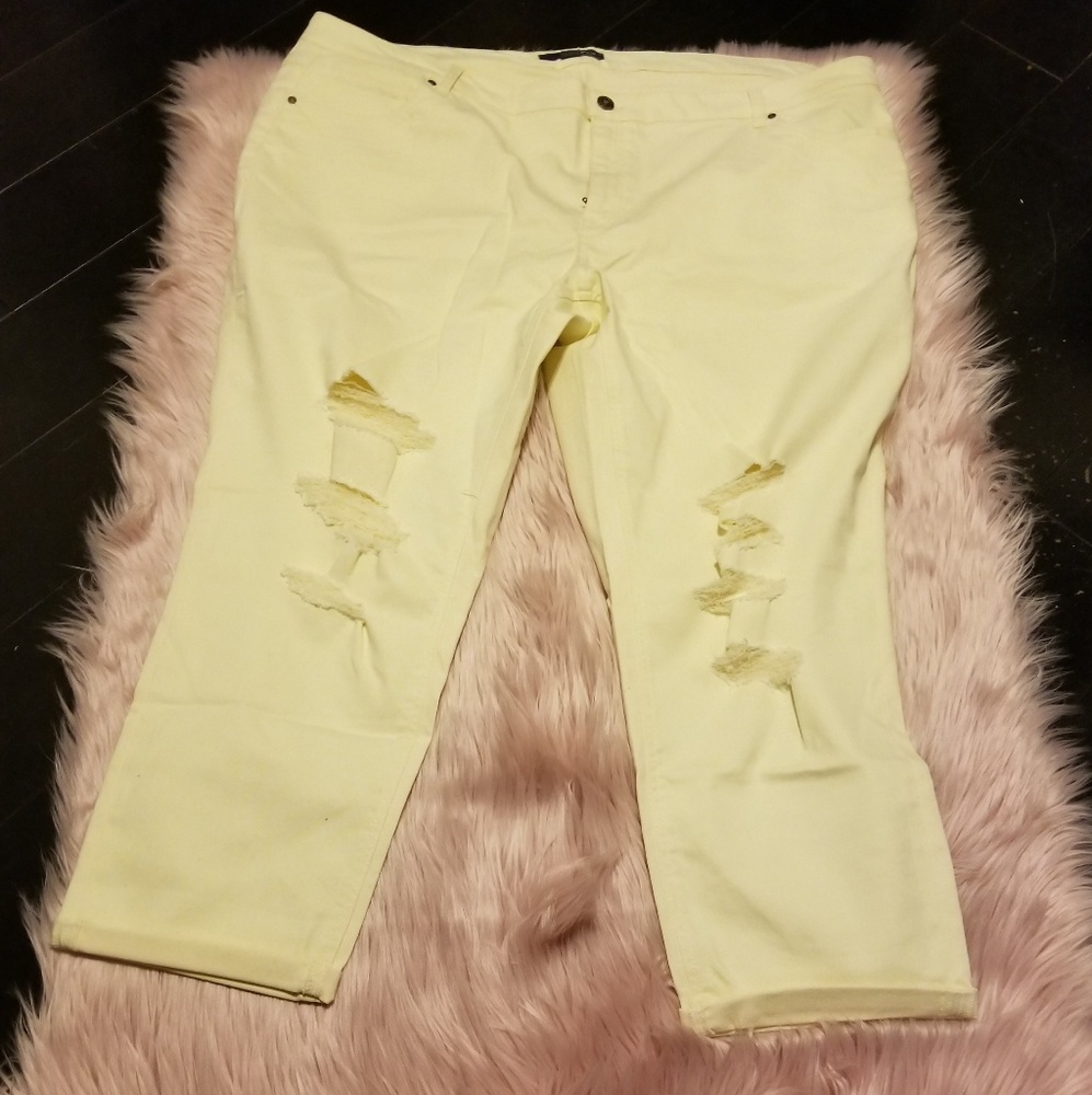 Light yellow distressed jeans